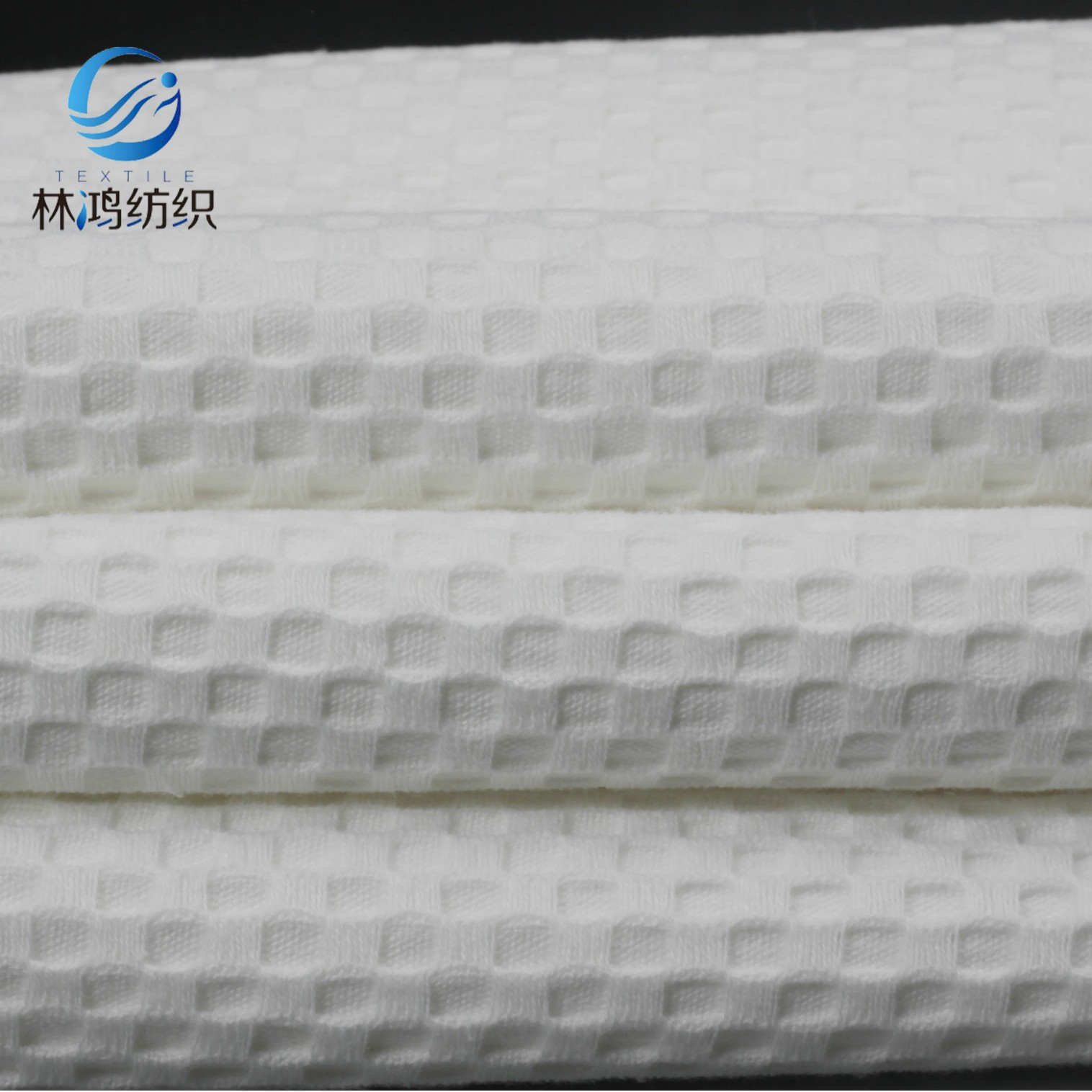 厂家阴阳格面料 酒店用柔软浴衣面料 手感舒适经编印花面料