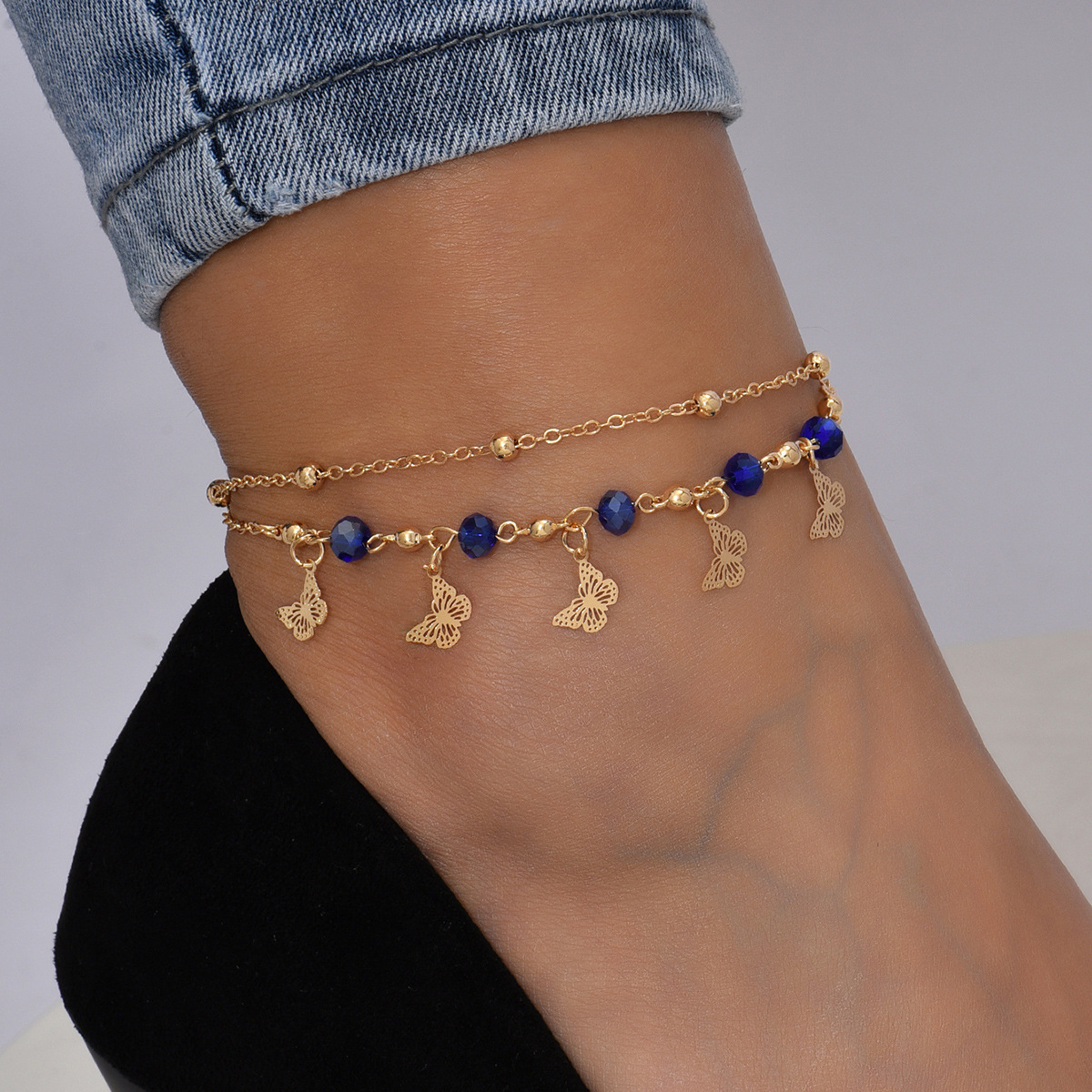 Nuevo cross-border de playa europea y americana pulsera pulsera mujer diamantes huecos flores mariposas hechas a mano pie diseño famoso