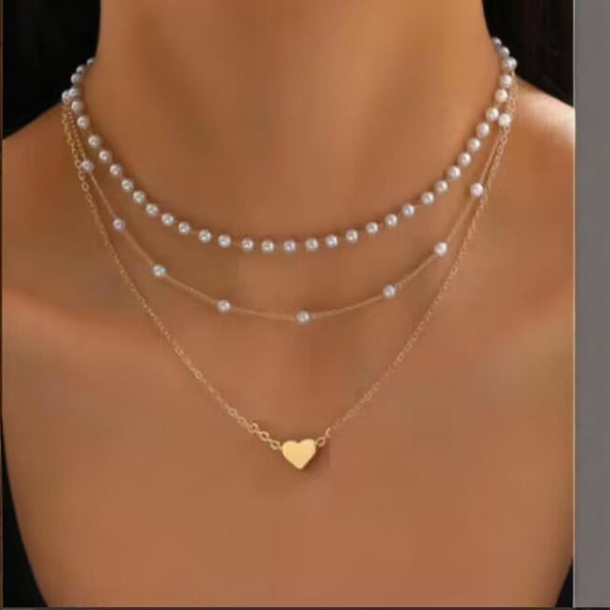 Collana di perle con fiocco a y e ciondolo a nappa_voghion.com