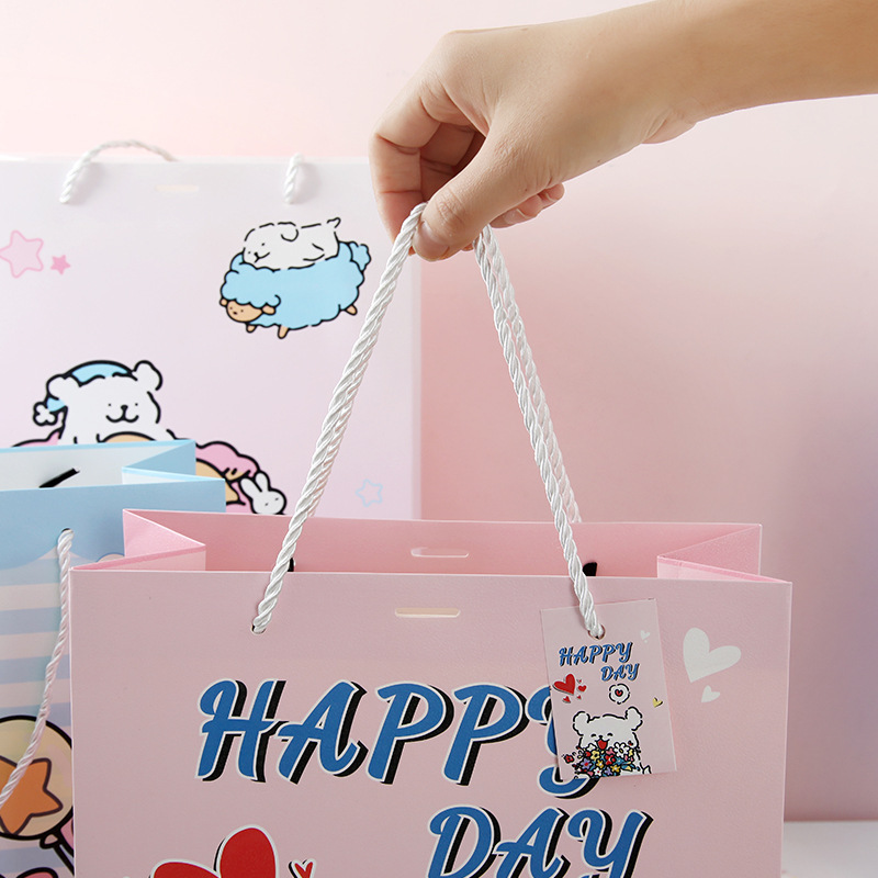 Bolsas de regalo de perros curvas bolsas de dibujos animados bolsas de estudiantes bolsas de mano bolsas de regalo de mano bolsas de caja de regalo