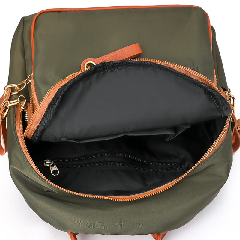 Bolsos para mujer 2023 nueva mochila de nylon para mujer coreana moda contraste color al aire libre mochila de viaje ligera al por mayor