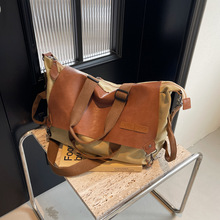 跨境2025新款小众原创设计复古帆布拼皮单肩斜挎包潮牌户外旅行包