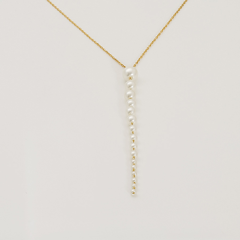 Nuevo estilo de acero inoxidable francés simple una palabra colgante de perlas personalidad femenina creativa collar de tamaño de perla larga mujer