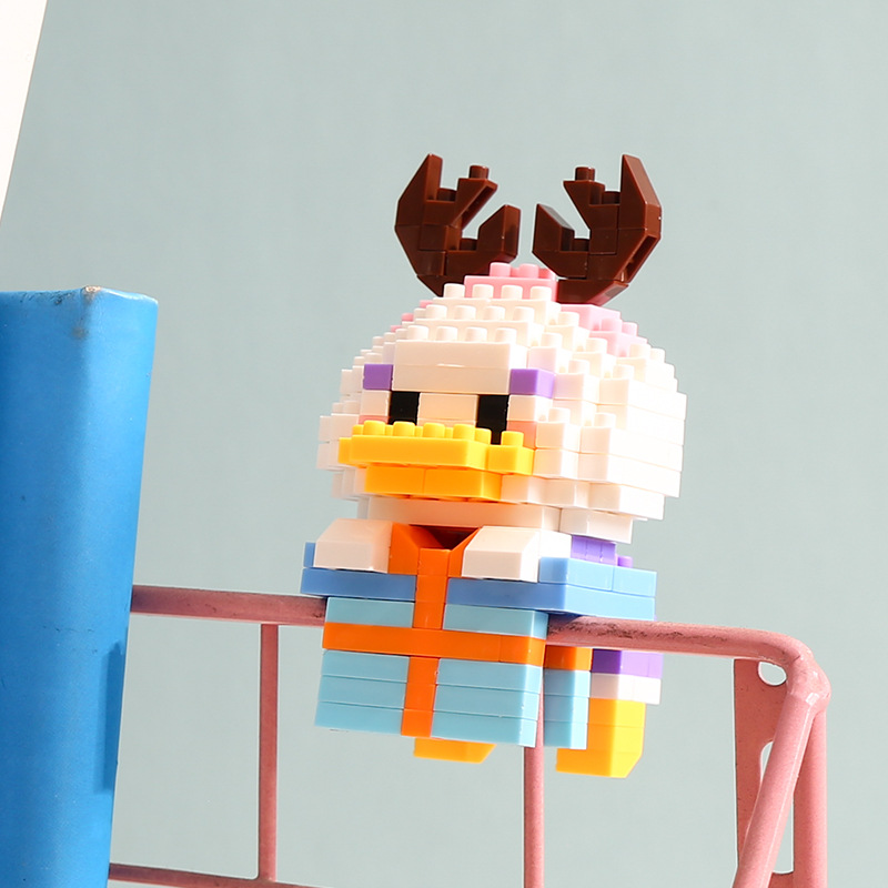 Compatible con LEGO gigante Panda flor azul lindo muñeca de dibujos animados montado bloques construcción juguete para niños puesto caja ciega al por mayor