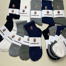 日本猿人头刺绣纯色黑白灰运动滑板中筒男女情侣潮袜四季款跑步袜