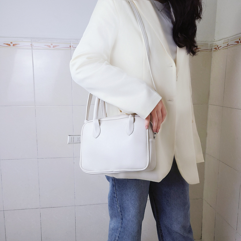Design di nicchia coreano con la stessa borsa color crema e una borsa elegante, borsa quadrata con croce diagonale a spalla singola_voghion.com