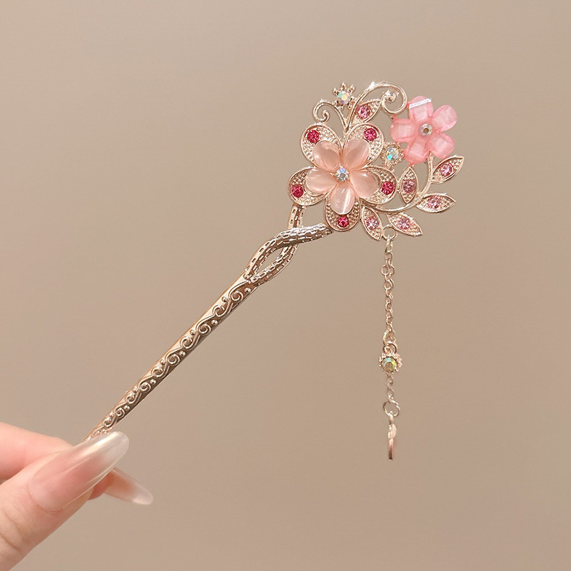 1 cabello de flor rosa