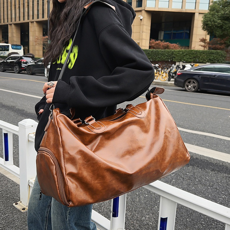 Bolso de viaje de corta distancia al aire libre de gran capacidad para hombres y mujeres con posición de zapatos Bolso diagonal de un solo hombro retro de moda Bolso de almacenamiento de moda