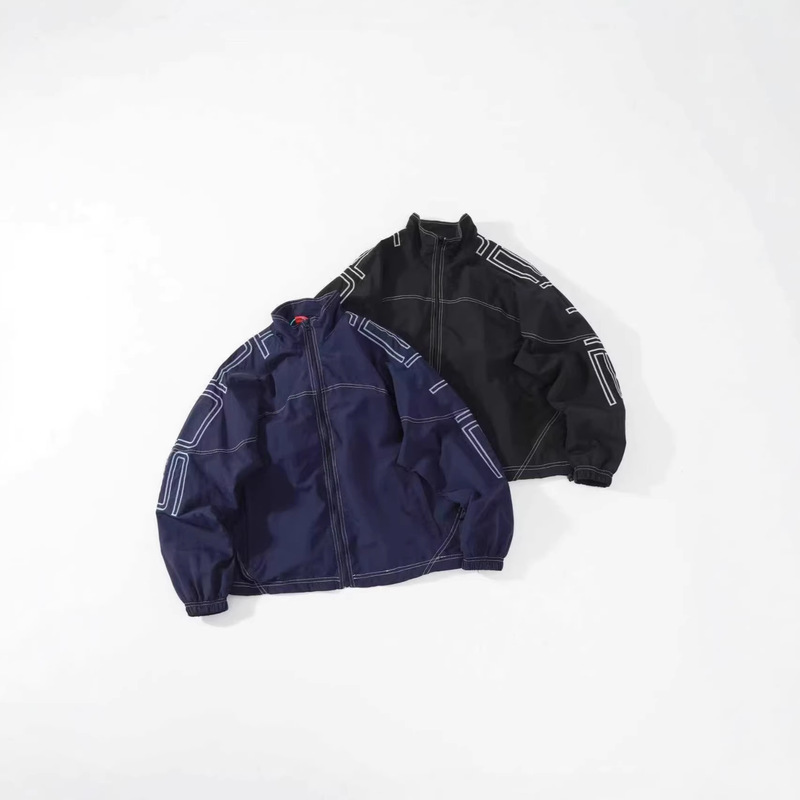 Direct Supply from Sup Store for Cross-Border E-Commerce: Shoulder Embroidery Logo, Stitched Coach Jacket, Long-Sleeve Outerwear, Unisex