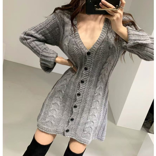 A lightweight, chic Korean-inspired youthful style V-neck linen pattern one-button open front design knit dress with slits at the sleeves