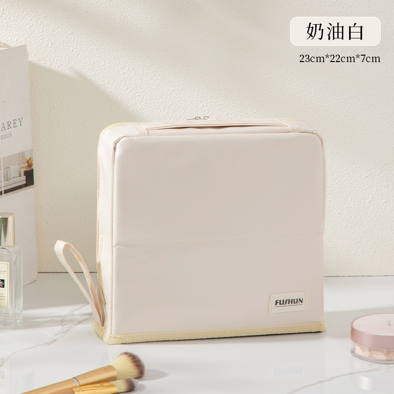 2025年新型PU化粧ポーチ 大容量 ハンドバッグ型 持ち運び便利 旅行必需品 分割式ペンケース 洗面用具入れ