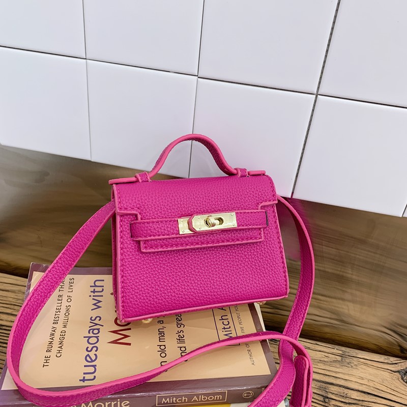 Bolso de hombro para niños y niñas de estilo coreano mini bolso de mensajero para padres e hijos de color sólido simple nuevo monedero con cerradura para niños