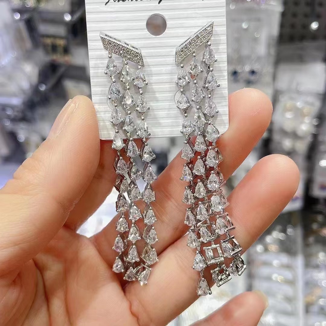fashionable elegant platinum long earrings drop-shaped with tassels