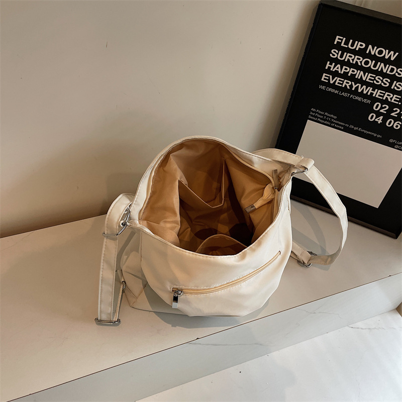 Nueva mochila multifuncional para mujer, bolso de viaje de textura de moda, bolso de mensajero, mochila de nailon de gran capacidad, bolso de hombro