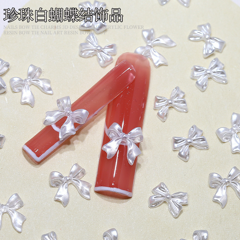Yiwu Nail Jewelry Pearl White Bow Classic White Ribbon Bow Tie Resin Diamond Little Red Book Nail Accessories