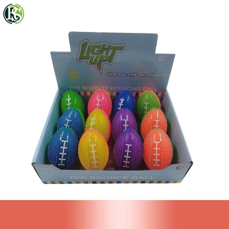 Factory direct sale luminous 8cm double color rugby TPR luminous elastic ball massage ball children's toy pet toy