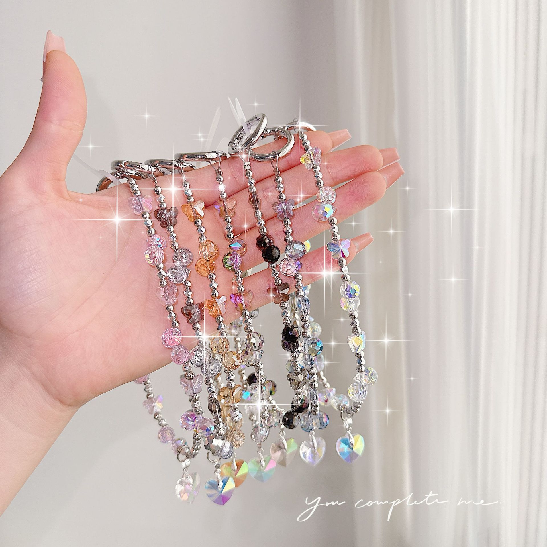 Boutique hecho a mano de alta gama teléfono móvil cadena colgante mujer ins fresa mariposa amor colgante moda teléfono móvil cadena colgante corto