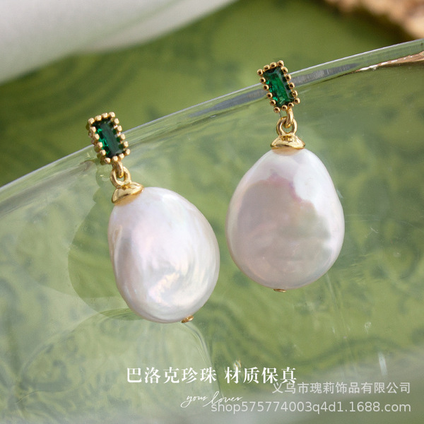 Organic earrings from pearl with bow heart shaped with tassels