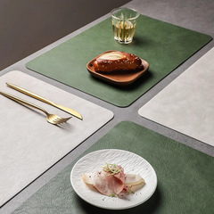 クロスボーダーのレトロな牛革の紋様の食事のマットのフランスの高級感の両面の皮革の防水の洋食のマットのホテルのお茶のテーブルのマット