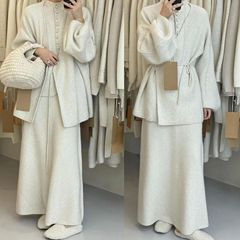 服の番号は自分でアライグマの毛のデザイナーの3セットのベストのコートの女性の怠惰な風の純色のニットのスカートの韓国系の新しいです。