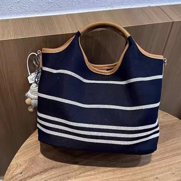 South Korea Niche Design Canvas Bucket Bag 2025 New Color Contrast Large Capacity Casual Tote Bag Commuter Crossbody Bag