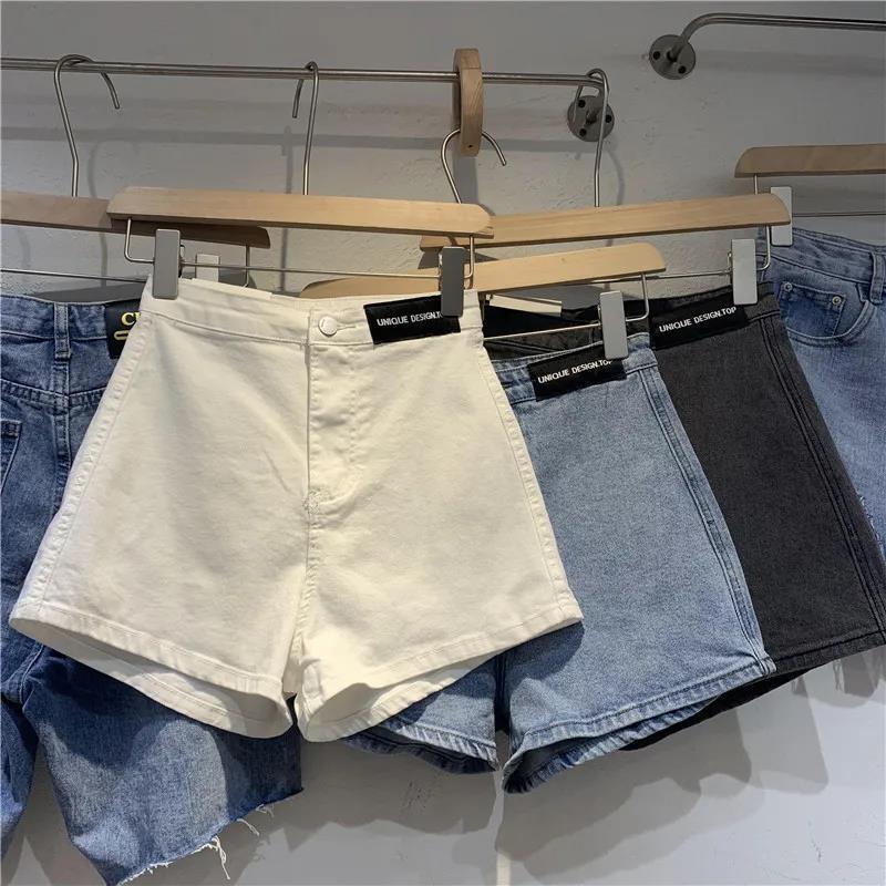 Elastic tight labeling Denim shorts women's ins summer thin A- line pants bottoming outer wear hip lifting straight wide leg hot pants