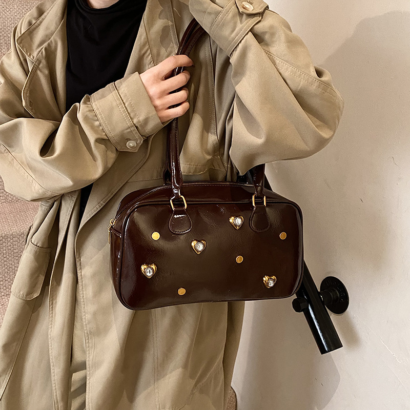 Bolsos transfronterizos de nuevo estilo para mujer Bolsos de almohada de alta gama de moda simple urbana Bolsos de hombro de todo fósforo diario para mujer