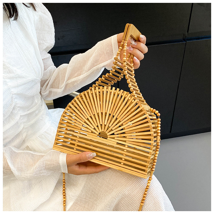 Women's Medium Bamboo Weaving Solid Color Vacation Classic Style Hollow Semicircle Magnetic Buckle Crossbody Bag display picture 9