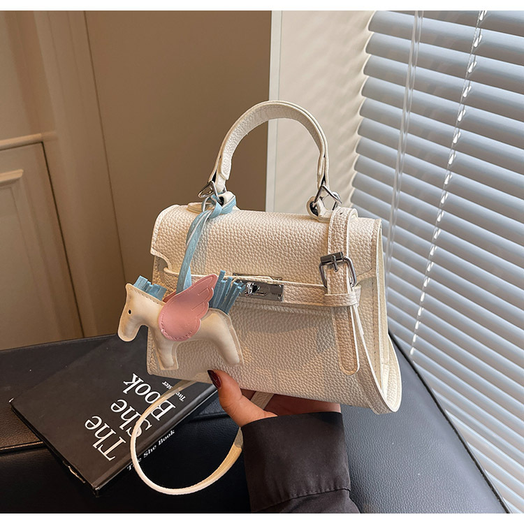 The Korean version of the hand-held small square bag for women in 2025, a new single-shoulder bag with a niche design, simple and versatile, trendy crossbody Kelly bag undefined