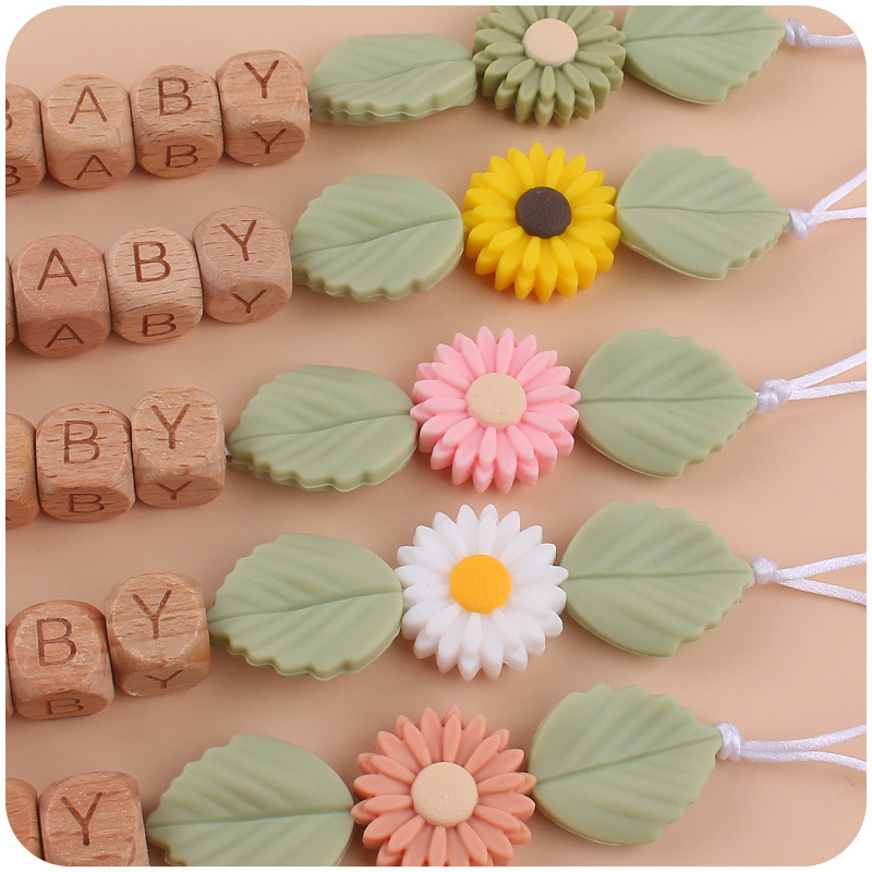 Suministros para bebés Beech chupete clip creativo bebé de dibujos animados de silicona Daisy bite molar chupete cadena anti-gota cadena
