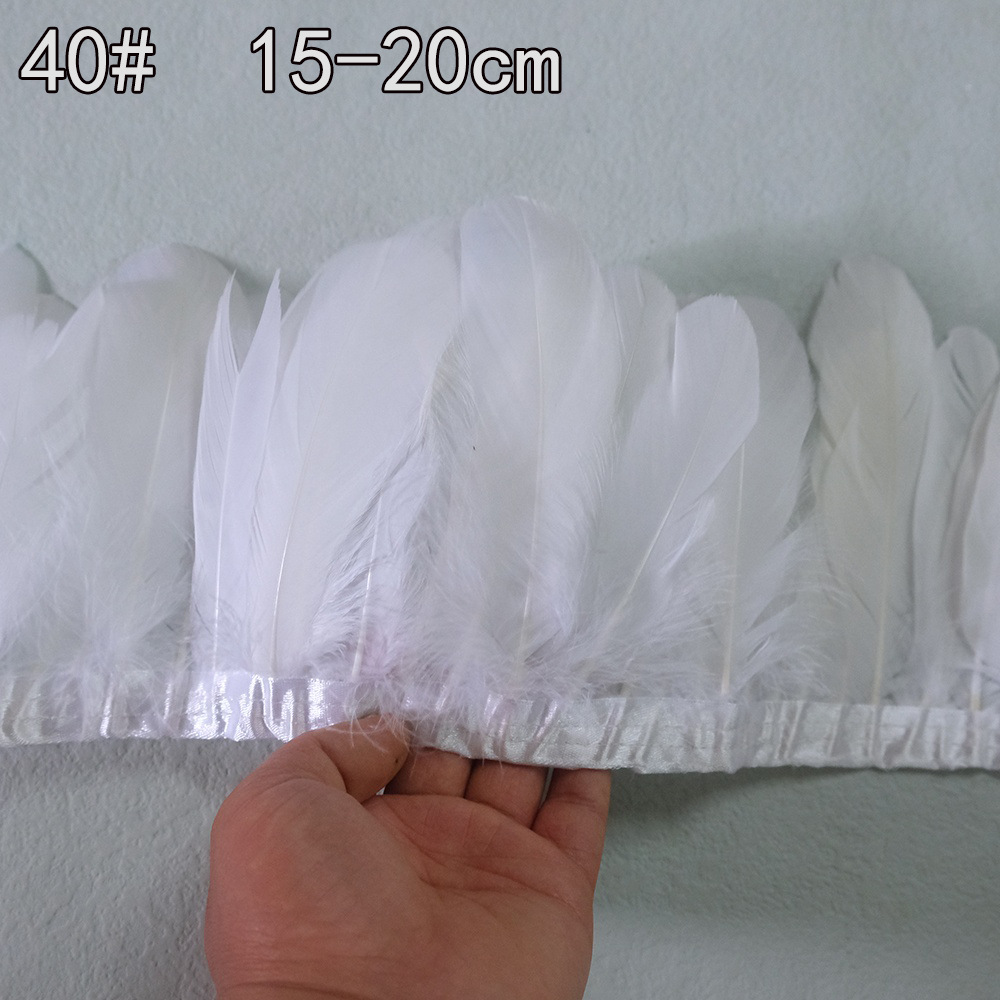 Colección de productos de plumas blancas al por mayor Accesorios de ropa de plumas hechos a mano de bricolaje Accesorios de plumas de ganso Material de plumas de pavo