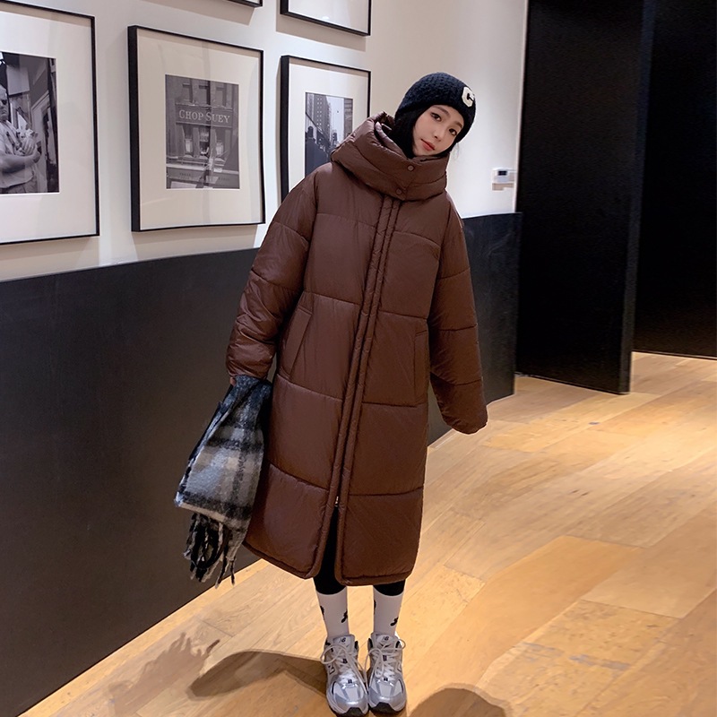 2025 nuevo estilo coreano suelto y grueso ropa de algodón largo sobre la rodilla encapuchado ropa de algodón chaqueta de moda roja en línea
