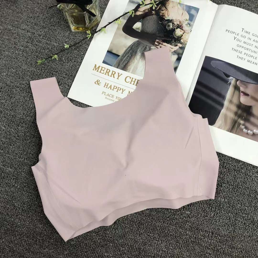 Nueva ropa interior deportiva de color sólido de las mujeres pequeño pecho push up pecho grande pequeño sujetador inalámbrico adhesivo sin costuras Sujetador deportivo