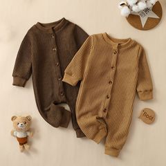 2025国境を越えた秋冬の赤ちゃんのワンピースの前に単列ボタンをつけて長袖の丸首の通気性を高めて服を登ります。