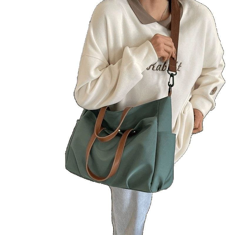 Universal laptop, handheld capacious purse one shoulder
