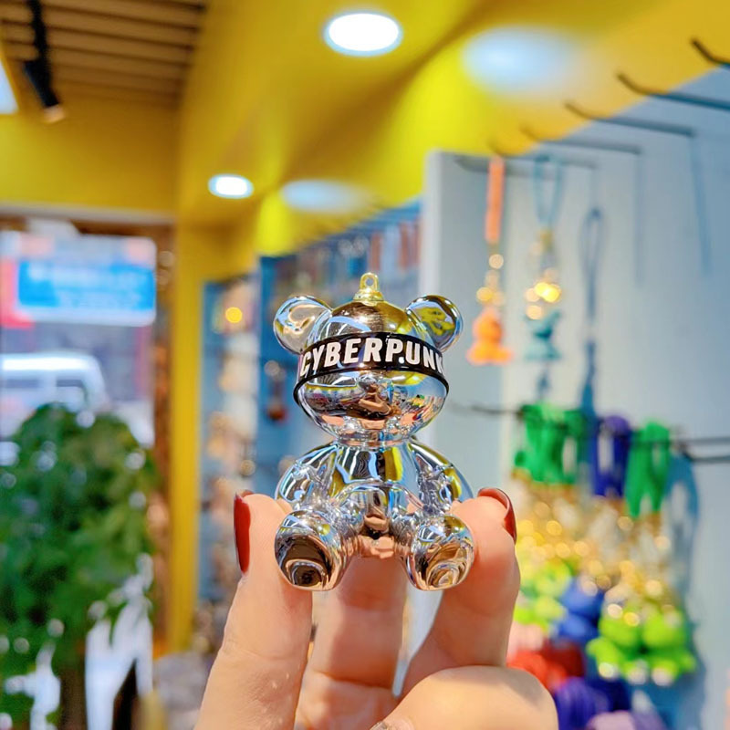 Resina de dibujos animados colorido gradiente oso llavero creativo postura sentada red oso llavero de moda colgante de llave de automóvil