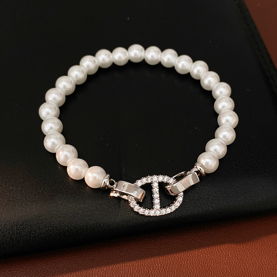 Pulsera de perla de nariz de cerdo de piedra de diamante redonda, pulsera ligera y lujosa, pulsera de nicho, joyas de moda versátiles.