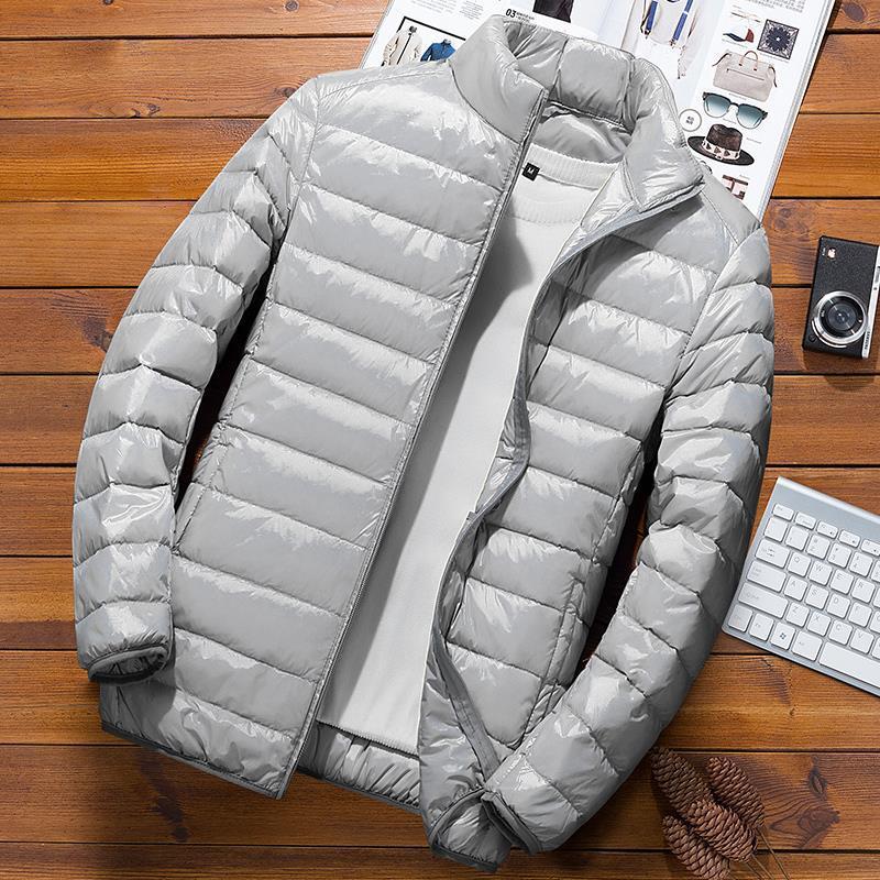 Chaqueta de algodón acolchado ligero para hombres cortos 2023 Otoño e Invierno Nuevo estilo coreano de moda guapo collar de pie chaqueta juvenil