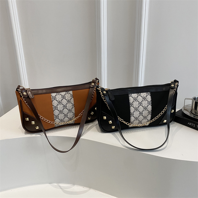 Bolso de mujer 2025 primavera nueva moda retro esmerilado empalme bolso de color contraste bolso de mujer un hombro brazo bolso de moda