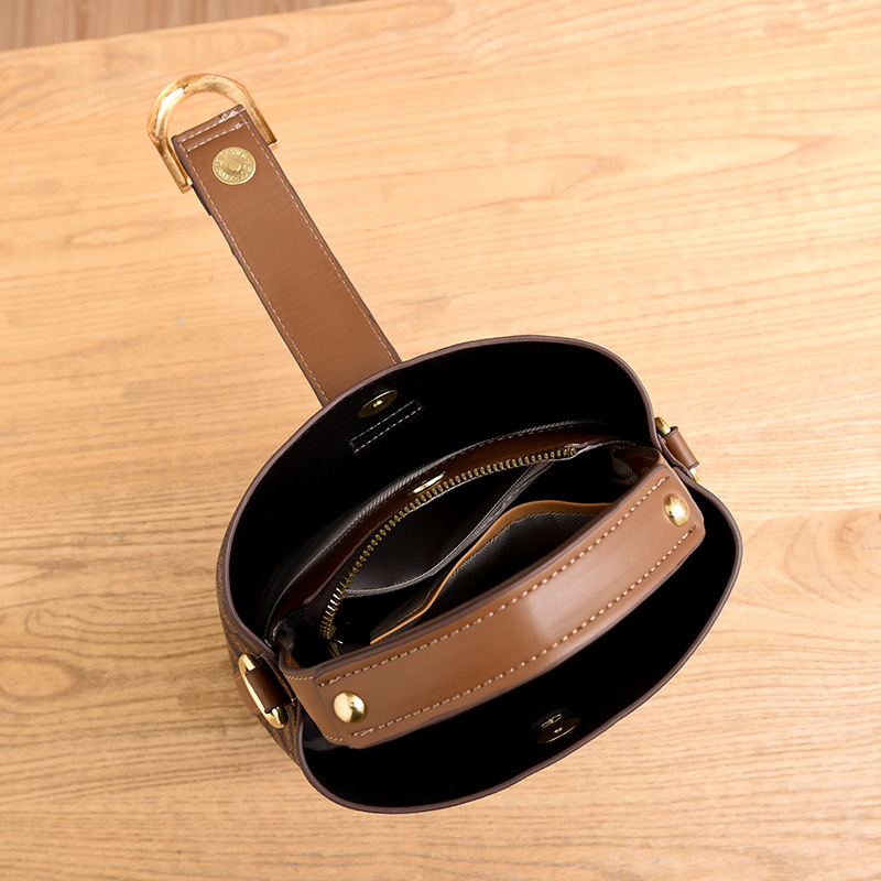 Petits sacs à main de mode en gros pour femmes, nouveaux sacs seau, sacs simples pour femmes de banlieue, sacs à bandoulière texturés_voghion.com