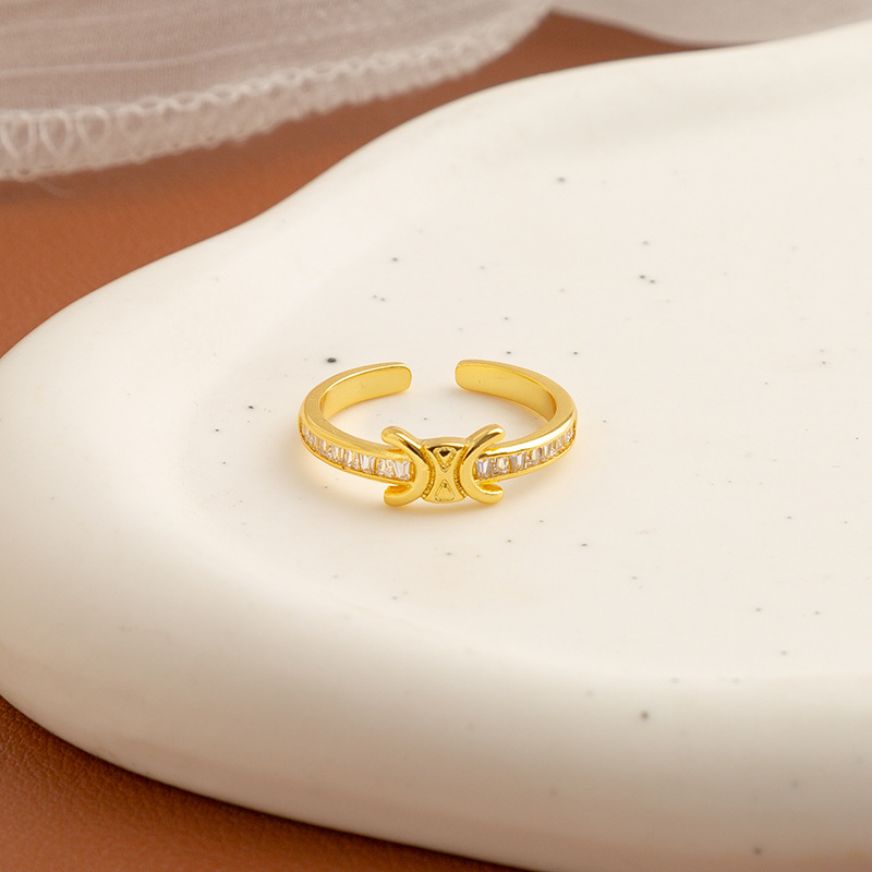 Golden ring with stone with zircon