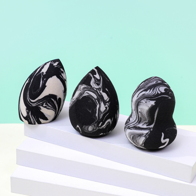 Personalizado de fábrica, mezcla de colores transfronterizos, maquillaje en forma de gota, soplo de polvo de huevo, no coma polvo, se agranda con el agua, esponja de maquillaje sin látex