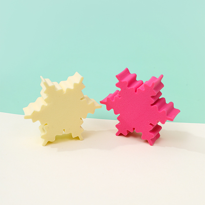 Fábrica personalizada copo de nieve plano soplo transfronterizo sin látex esponja de maquillaje cojín de aire huevo de belleza seco y húmedo al por mayor