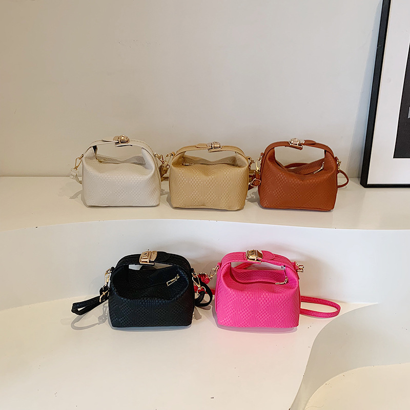 Bolsa de mano a rayas de moda coreana para mujeres otoño / invierno 2024 nuevo estilo simple bolso de hombro personalizado gran capacidad mochila