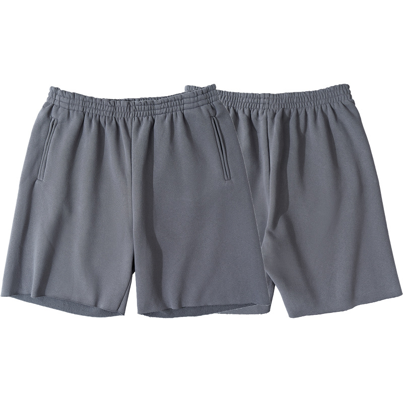 Alta versión YEEZY Kanye desgaste mismo estilo color sólido fleece-forrado High Street angustiado deshilachado pantalones cortos deportivos