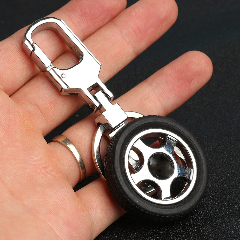 Wholesale small gift pendant men's waist tire rotating car logo pendant metal key ring car keychain Wholesale small gift pendant men's waist tire rotating car logo pendant metal key ring car keychain