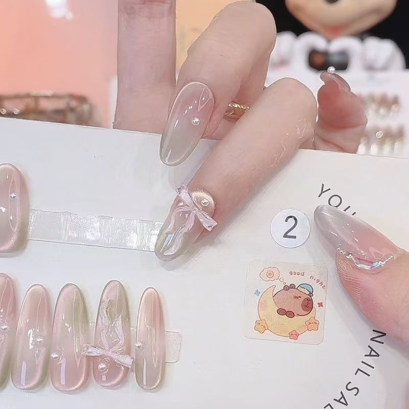 Melocotón Limina Pura hecha a mano con armadura intermitente ojo de gato degradado mariposa temperamento ligero lujo uñas de uñas removibles