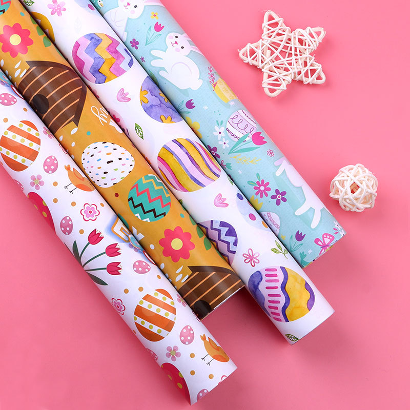 Papel de regalo de Pascua con diseño de conejo de dibujos animados para envoltura de regalos de productos nuevos transfronterizos de Amazon, fabricante mayorista de embalaje de regalos para bricolaje.