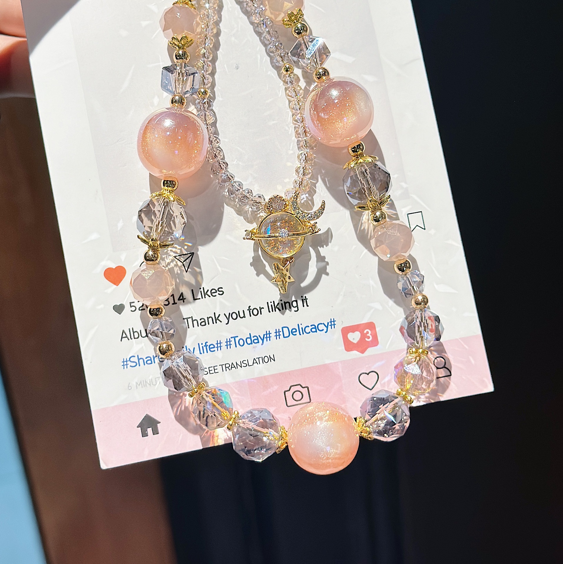 Boutique hecho a mano de alta gama para teléfono móvil cadena larga de vidrio de universo pequeño femenino cordón de teléfono móvil de moda colgante de mensajero largo