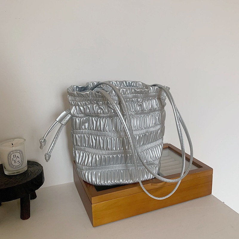 Korean INS niche design, gentle soft leather pleated drawstring bucket bag, one shoulder fashionable texture, silver_voghion.com